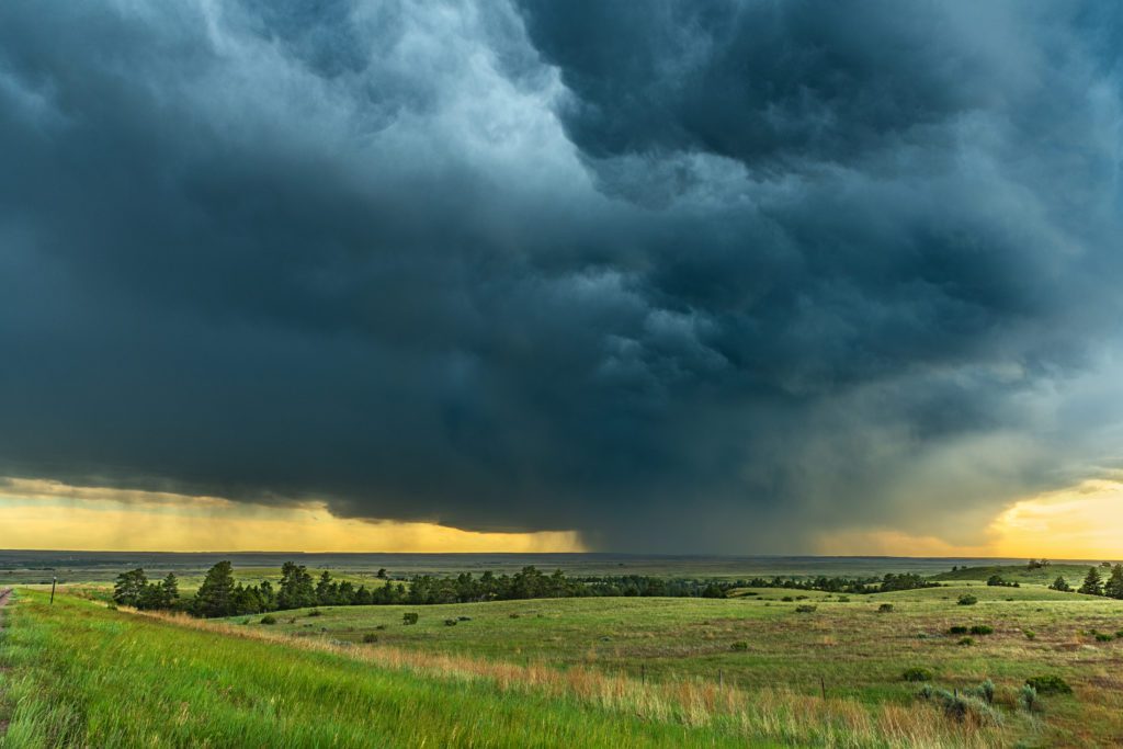 Rainstorm over Grassy field